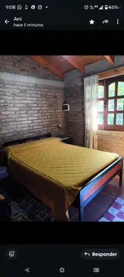 a bedroom with a large bed in a room at Pao Pei in Santa Rosa de Calamuchita