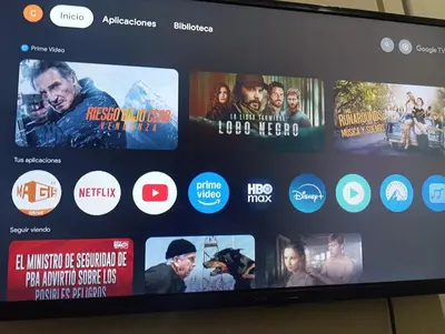 a television screen with many movies on it at Cabrales in Cordoba