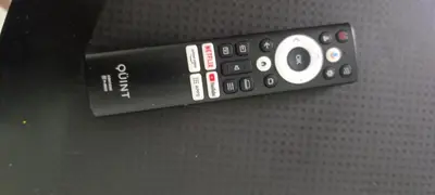 a remote control sitting on top of a table at Cabrales in Cordoba