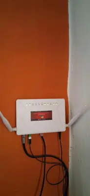 a white outlet with wires plugged into a wall at El rancho de cristina y victor in Arroyo de Los Patos