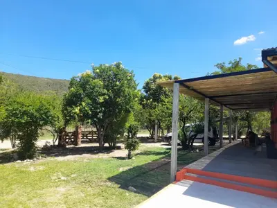 a view from the porch of a house with trees at La Casa De Mi Viejo in San Javier