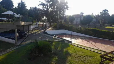an overhead view of a tennis court in a yard at Dpto 22 in Villa Carlos Paz