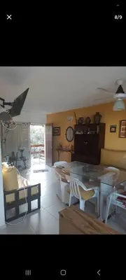 a kitchen with a table and chairs in a room at Dpto 22 in Villa Carlos Paz