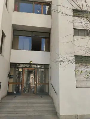 an external view of a building with a revolving door at Great Lofty in Cordoba