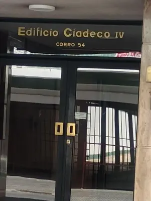 a sign over the doors of a building at I rent an apartment in the center of Cordoba Capital in Cordoba