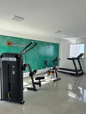 a gym with two exercise bikes in a room at departamento en edificio torre libertador in Río Tercero