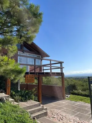 a house with a view of the ocean at Ludqui in Villa Rumipal