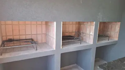 two views of a fireplace in a room at Miralejos 16 Turquesa in Villa Carlos Paz