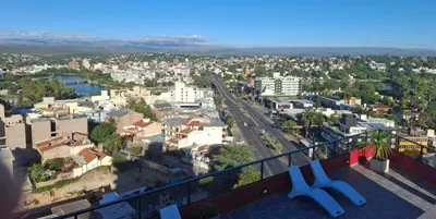 a view of a city from a balcony at Miralejos 16 Turquesa in Villa Carlos Paz