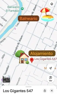 a map of a city with a house and an umbrella at Departamento Carlos Paz cerca Centro y Río in Villa Carlos Paz