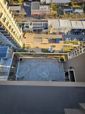 an overhead view of a building with drawings on it at Hermoso Departamento tipo Duplex en piso 17y18 in Cordoba