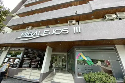 a store with a sign on the front of it at Departamento Céntrico Miralejos 3 in Villa Carlos Paz