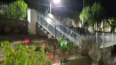 a blurry picture of a staircase in a garden at night at Lusanyun in Villa Carlos Paz
