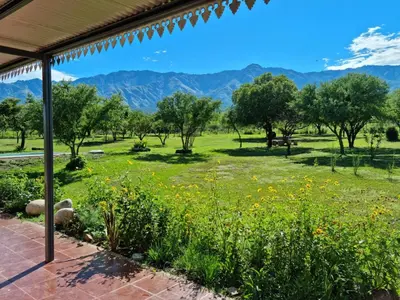 a view of a field with trees and mountains at Finca La Linda in San Javier