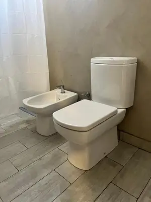 a bathroom with a toilet and a sink at Único y hermoso in Cordoba