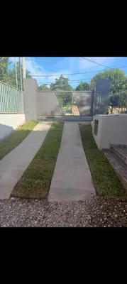 a skate park with a skateboard ramp and a sidewalk at La casita in Villa Carlos Paz