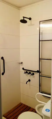a bathroom with a toilet and a shower at Depto Privado Quality in Cordoba