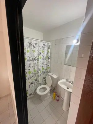 a bathroom with a toilet and a sink at DEPARTAMENTO 1 dormitorio plaza Colón en la mejor zona del centro de Córdoba in Cordoba