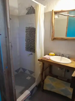 a bathroom with a sink and a shower at Rafael Arcangel in Nono