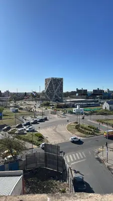 a parking lot with cars parked in a parking lot at Centro Cordoba in Cordoba