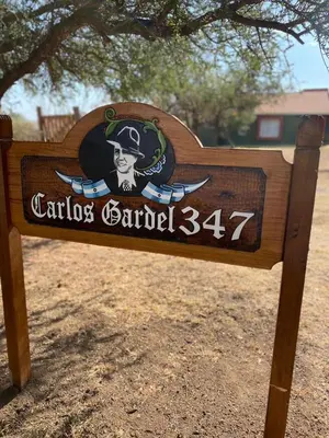 a sign for a cantosarioario is shown at Alojamiento Mabel in Merlo