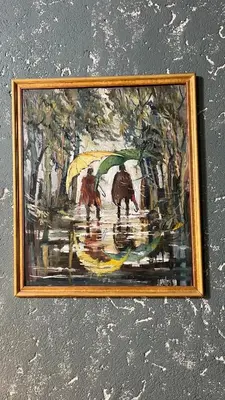 a painting of two people with an umbrella at Terrazas Suite in Potrero de Garay