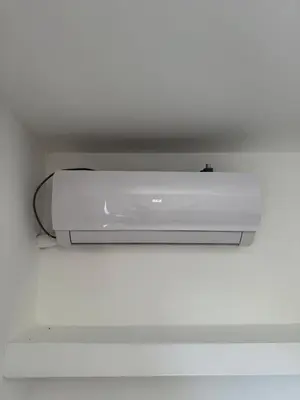 a television hanging from a ceiling in a room at Puntasol vcpaz in Villa Carlos Paz
