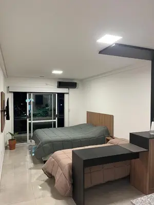 a bedroom with two beds in a room at Centrico con Garage Monoambiente a Estrenar in Villa Dolores
