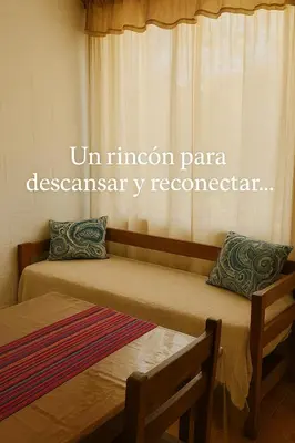 two beds in a room with the words unuminati pantera desasyasy respondent at Lavanda y Romero Villa Yacanto de Calamuchita in Villa Yacanto