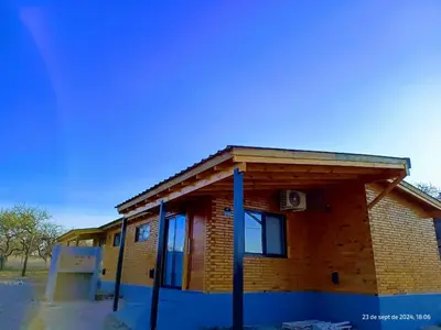 a small brick building with a roof at Cabanas del Solar in Los Reartes