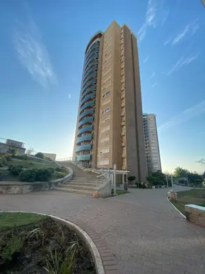 a tall building with stairs in front of it at Departamento en córdoba, complejo Altos de Villasol , 3 dormitorios, 2 baños in Cordoba