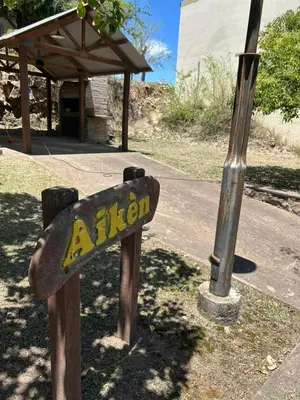 a sign that says african on the side of a road at Aiken Embalse in Embalse