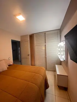 a hotel room with a bed and a television at Urban loft in Cordoba