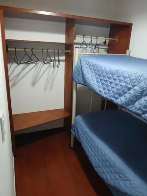 a couple of bunk beds in a room at Terrazas del Kempes- Sanatorio Allende Cerro in Cordoba