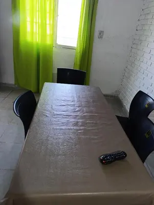 a remote control sitting on top of a table at La morada in Cordoba