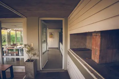 a hallway of a house with a fireplace at Lo de Paul in Hernando