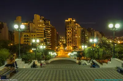 a city at night with lights and buildings at Departamento Nueva Córdoba in Cordoba