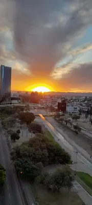 a view of a city with the sun setting at Magníficas VISTAS in Cordoba