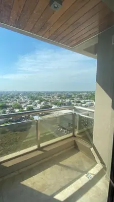 a view of a city from the balcony of a building at Departamento Barrio Cerrado Terra 2 seguridad 24h pileta in Cordoba