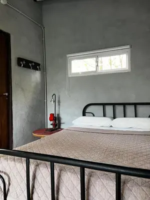 a bedroom with a bed and a window at Terrazas del Pinar, Loft con pileta exclusiva en bosque serrano in Villa Ciudad de America