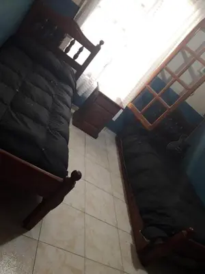 an overhead view of two beds in a room at Rincon del sol in Villa Carlos Paz