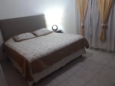 a bedroom with a bed in a room at Rincon del sol in Villa Carlos Paz