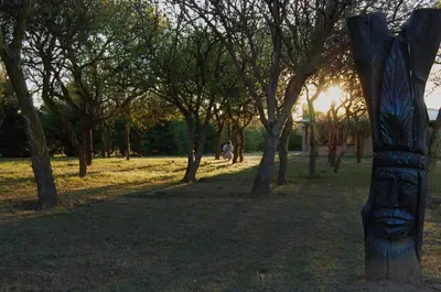 a wooden pole in a park with trees at Yerba Buena casas de campo - Nono in Nono
