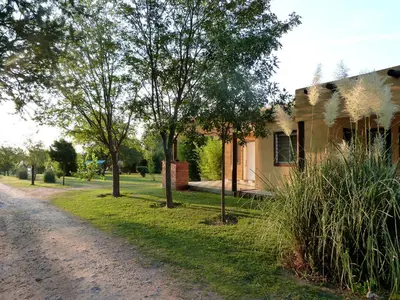 a house on the side of a dirt road at Yerba Buena casas de campo - Nono in Nono
