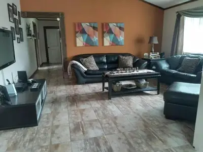 a living room with a couch and a coffee table at Bella Vista in Bialet Massé