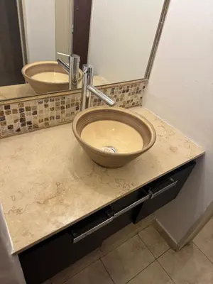 a bathroom with two sinks and a bowl sink at Gravensteen Urca in Cordoba