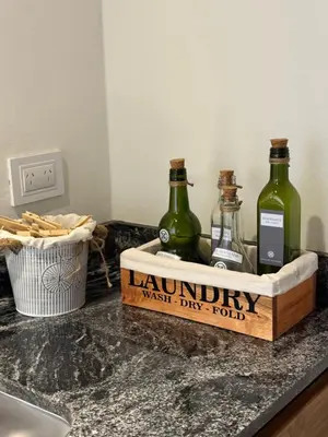 two bottles of wine sitting on top of a counter at Agua de Tajamar in Alta Gracia