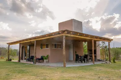 a house with a wooden roof at Aires de Paz in Las Calles
