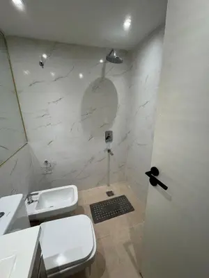 a bathroom with a toilet and a sink at Central & Comfy Apt in Córdoba in Cordoba