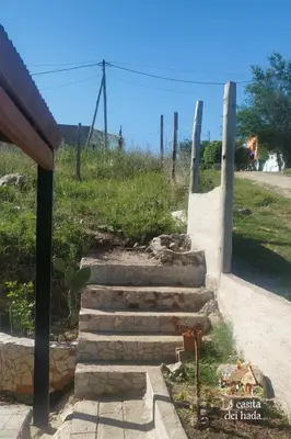 a set of stairs leading up to a house at La Casita del Hada in Santa María